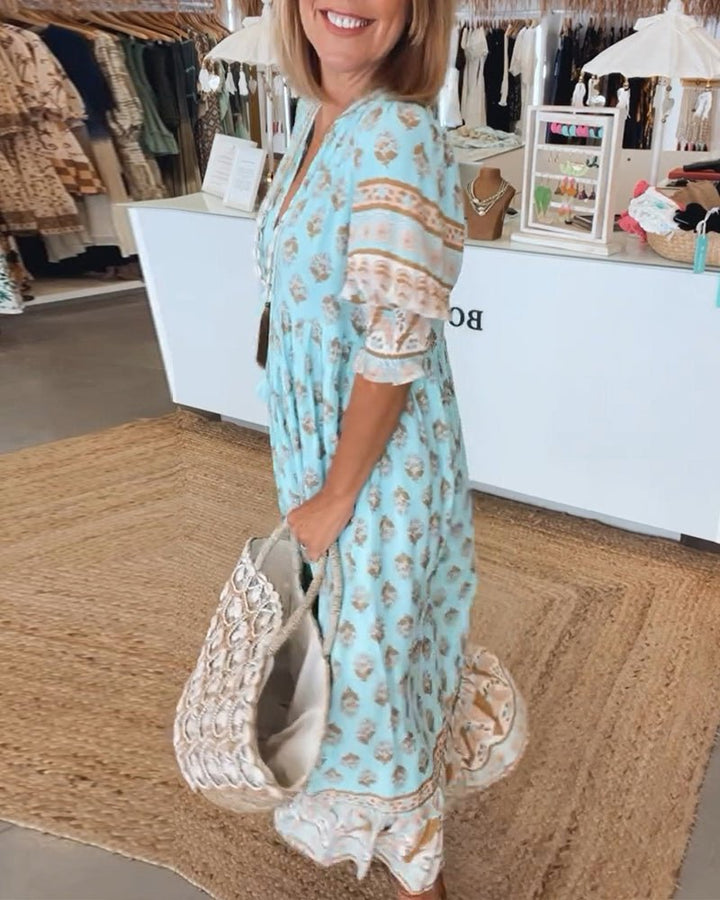 Mana | Abito midi chic a fiori con scollo a V