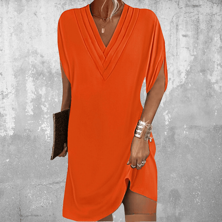 Minetta | Abito elegante dalla linea morbida sull'addome