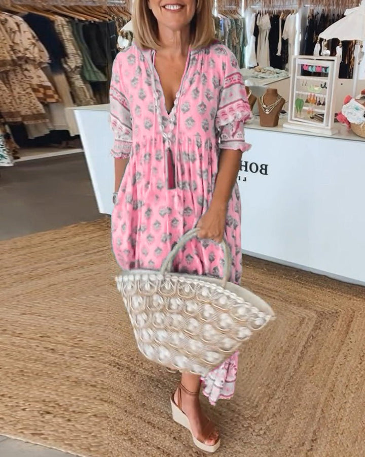 Mana | Abito midi chic a fiori con scollo a V