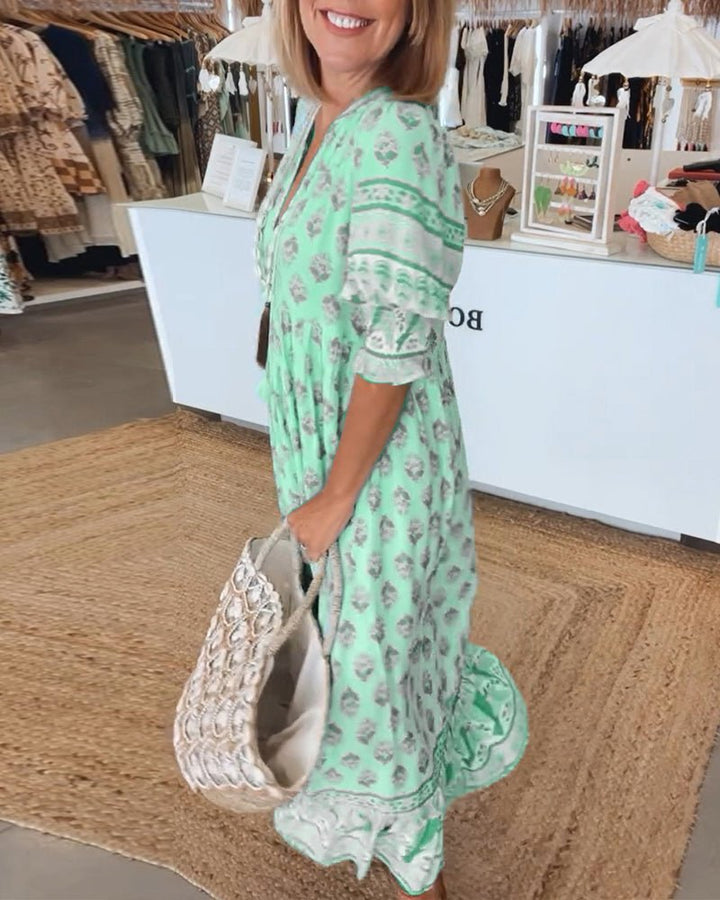 Mana | Abito midi chic a fiori con scollo a V