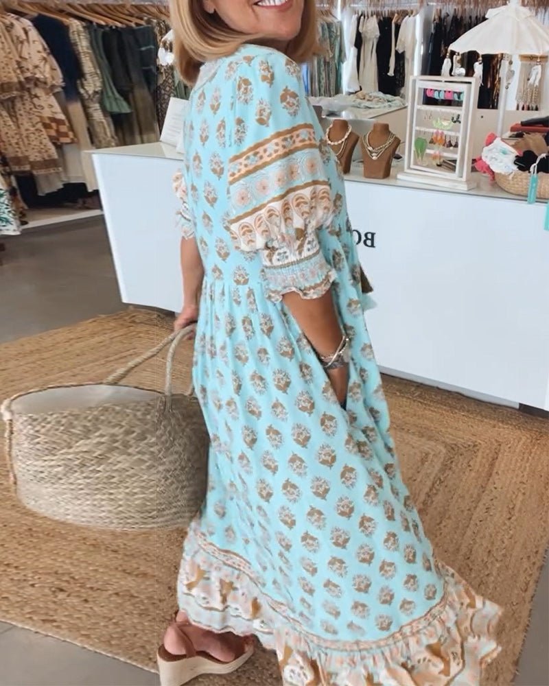 Mana | Abito midi chic a fiori con scollo a V