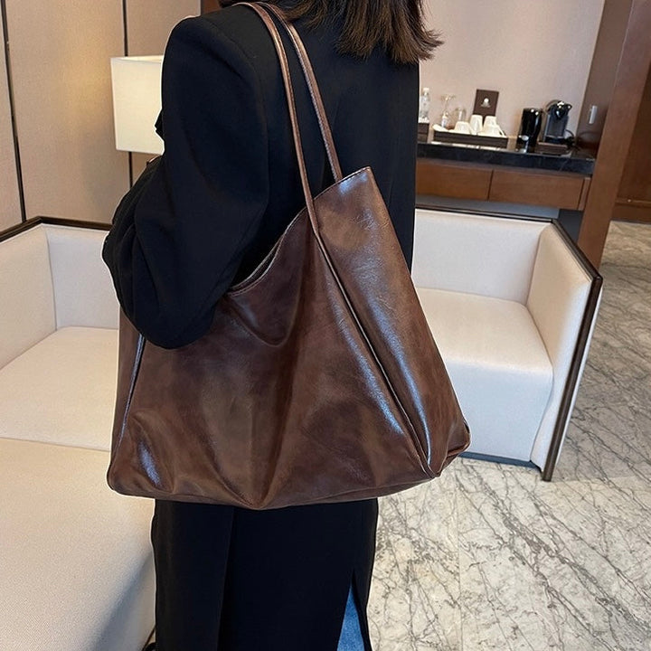 Patricia™ | Borsa in pelle luminosa