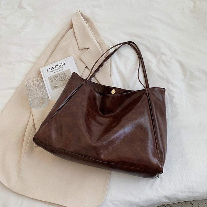 Patricia™ | Borsa in pelle luminosa