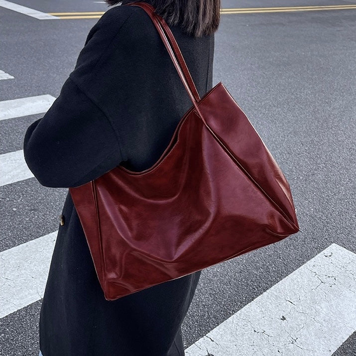Patricia™ | Borsa in pelle luminosa