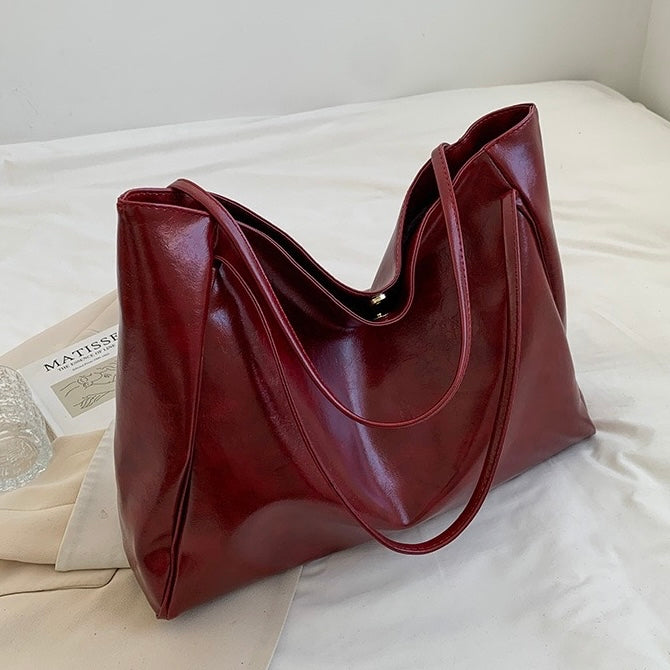 Patricia™ | Borsa in pelle luminosa