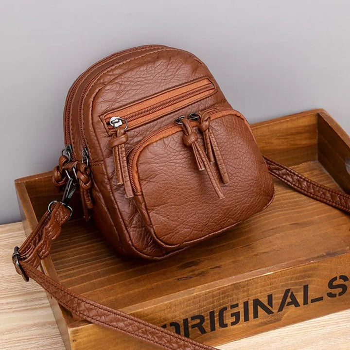 Sara™ | Borsa essenziale in pelle