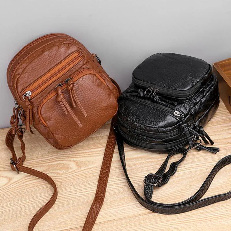 Sara™ | Borsa essenziale in pelle